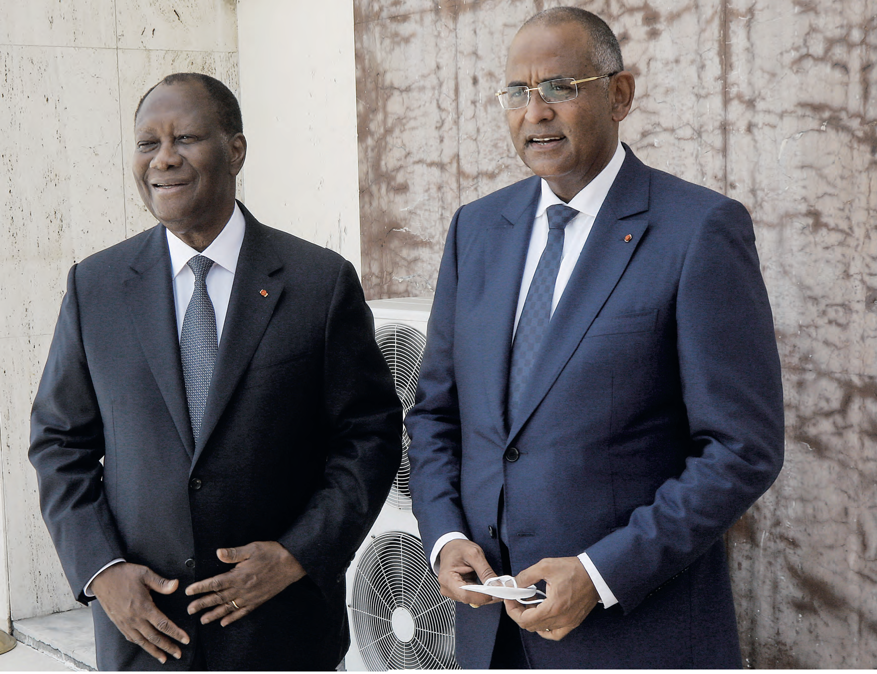 Le président Alassane Ouattara et le Premier ministre Patrick Achi.NABIL ZORKOT