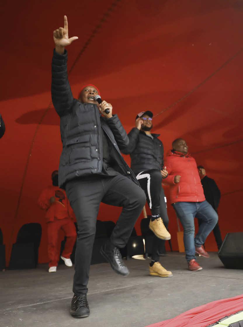 In the foreground, Julius Malema, the bubbling leader of the Fighters for Economic Freedom, during a rally ahead of local elections in Nyanga township, near Cape Town, October 22, 2021. MIKE HUTCHINGS / REUTERS