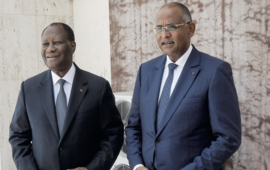 Le président Alassane Ouattara et le Premier ministre Patrick Achi. LUC GNAGO/REUTERS