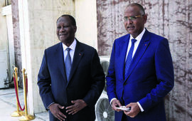 Le président Alassane Ouattara (qui fut le directeur général adjoint du Fonds de 1994 à 1999) et le Premier ministre Patrick Achi, en avril 2021.LUC GNAGO/REUTERS