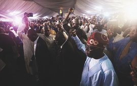The new leader celebrating at campaign headquarters in Abuja on March 1. KOLA SULAIMON/AFP