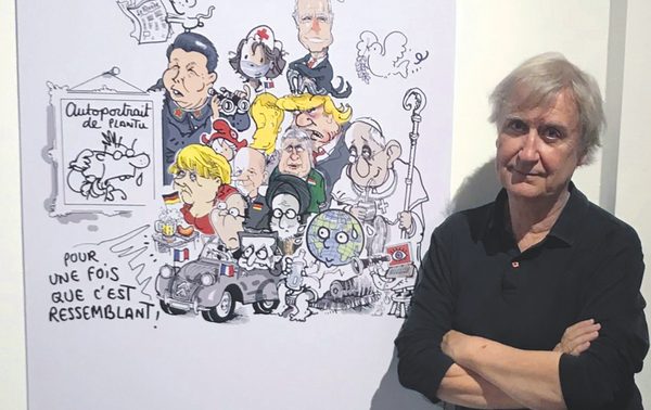 Le caricaturiste français devant l’un de ses dessins de presse.DR
